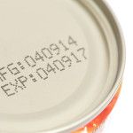 stock photo macro expiration date on canned food isolated on white background 263560733